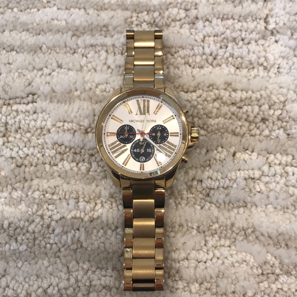 Michael Kors. Stainless steel watch. Gold.